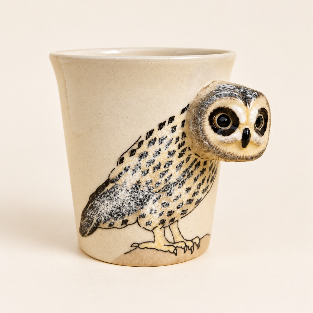 Owl Ceramic Mug on a warm ivory background