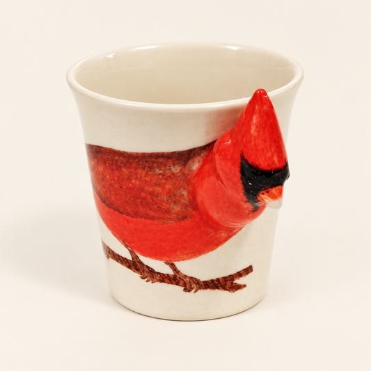 Cardinal Ceramic Mug on a warm ivory background