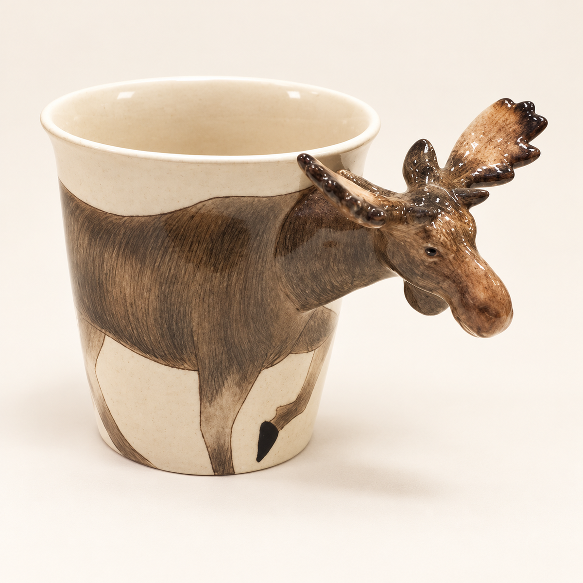 Moose Ceramic Mug on a warm ivory background
