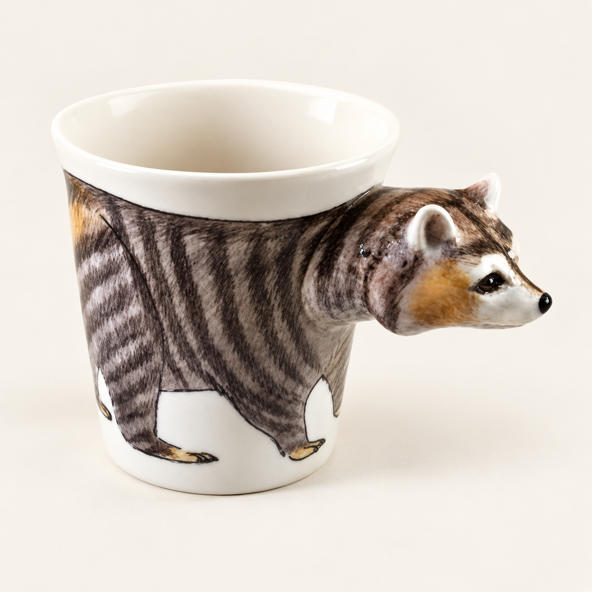 Raccoon Ceramic Mug on a warm ivory background